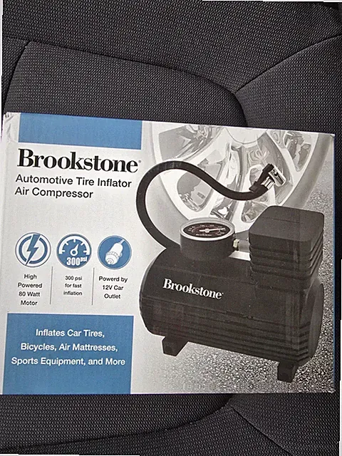 Brookstone Automotive Tire Inflator Air Compressor 300 PSI 12V Car Outlet